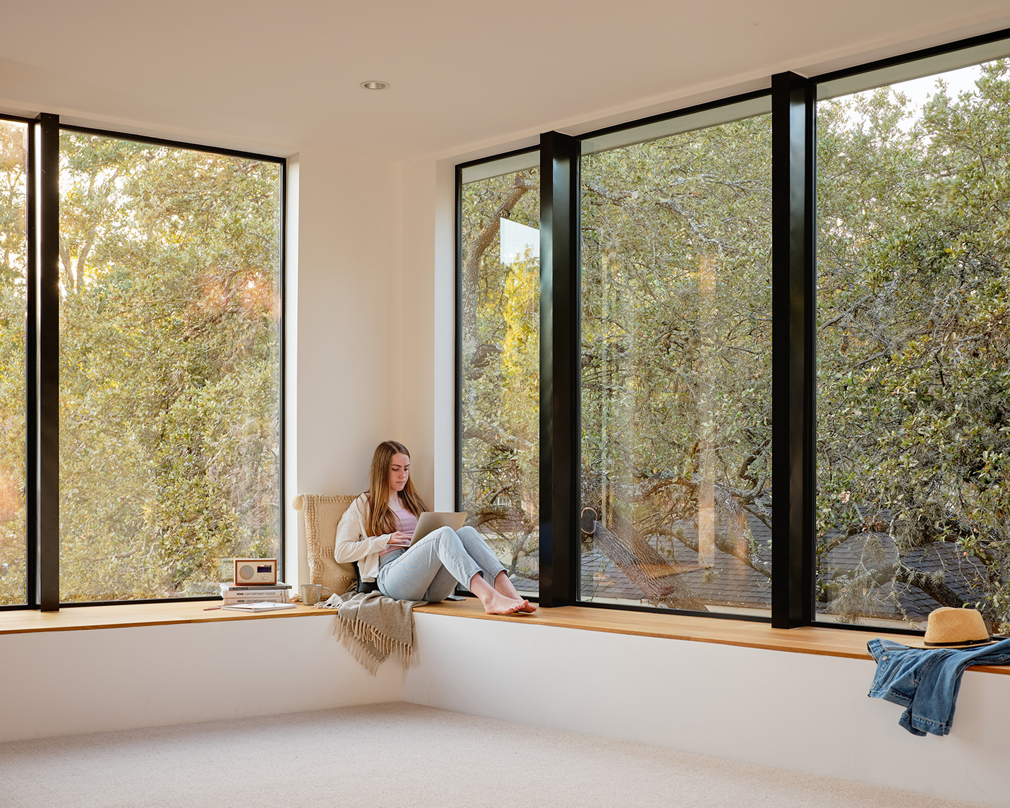 Austin Modern Home Addition window seat with woman reading